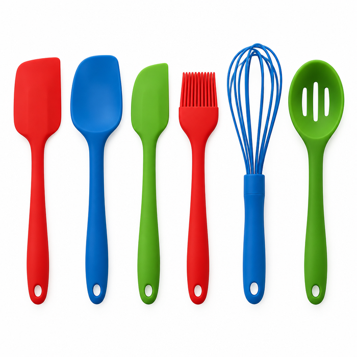 Set of colorful silicone spatulas on white background